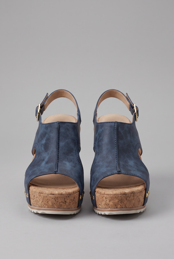 Women's open-toe platform wedge sandals with adjustable buckle for comfortable summer wear. Elegant casual footwear.