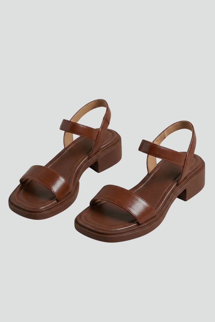 Women's orthopaedic sandals with cushioned insole & comfortable arch support, featuring a stylish block heel.