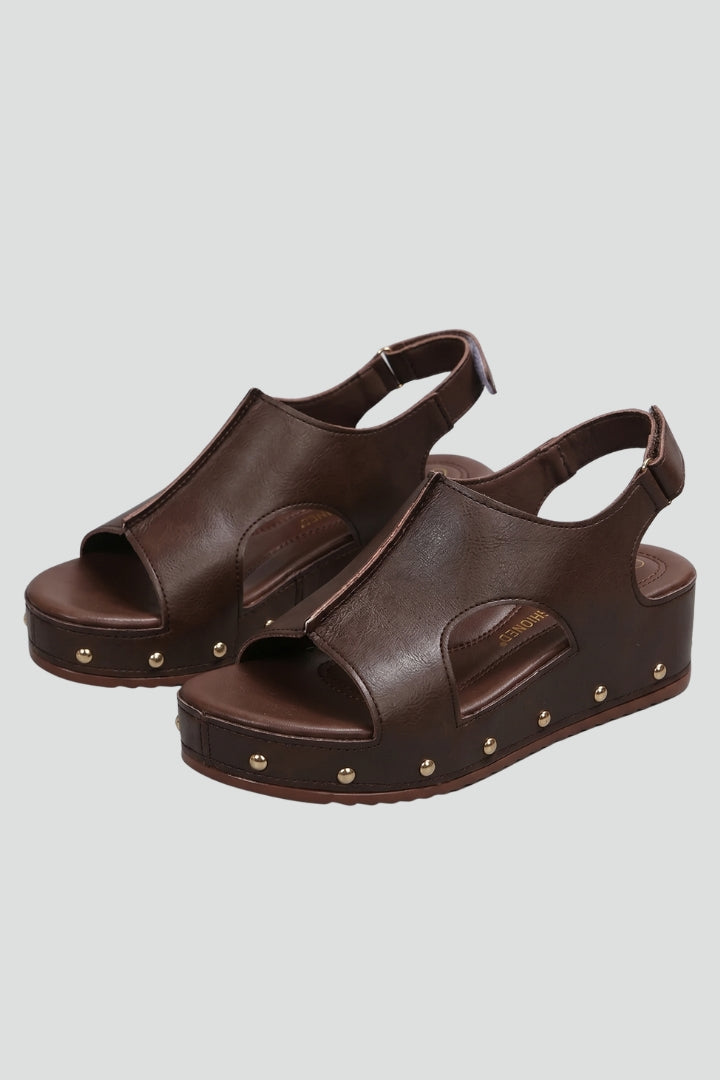 Women's cushioned platform sandals with stylish strappy design, perfect for summer comfort.