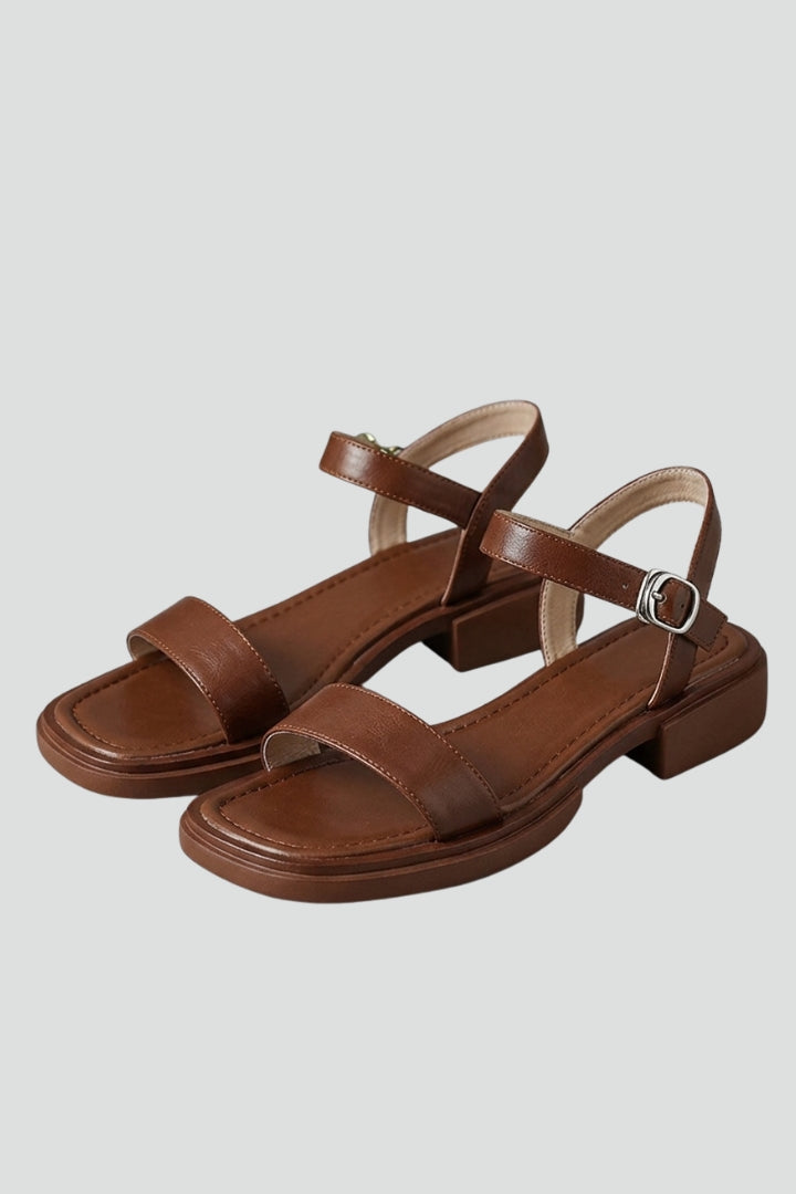 Women's adjustable strap block heel sandals for comfortable, stylish summer wear.