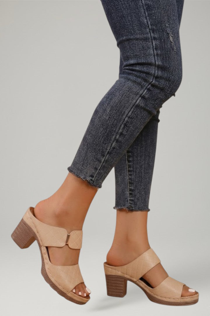 Women's comfortable block heel sandals with adjustable straps, perfect for all-day wear. Stylish summer footwear option.