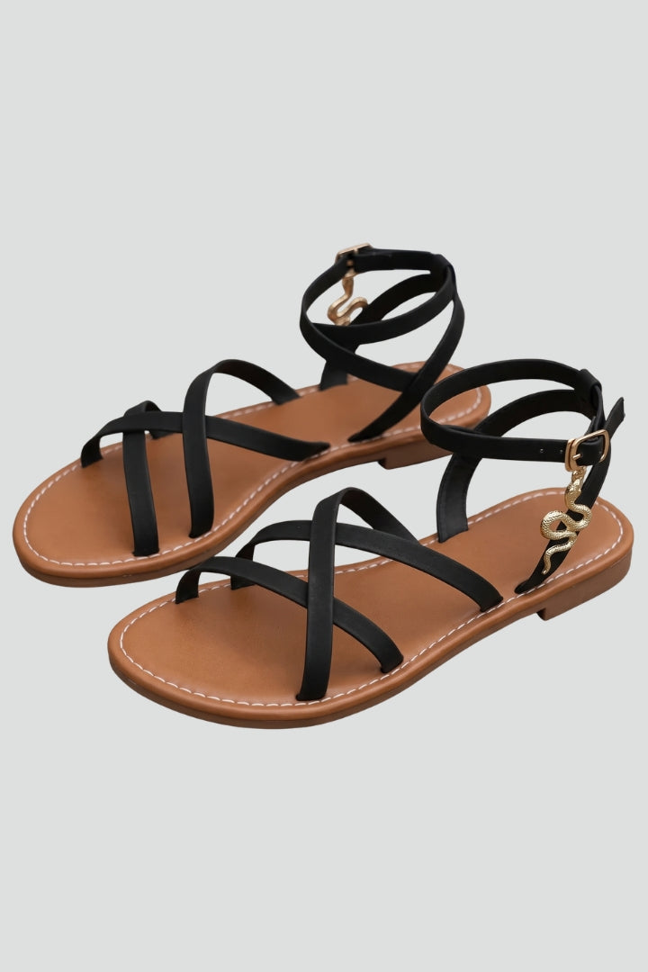 Women's black adjustable strappy flat sandals for comfort & style. Perfect summer footwear & casual everyday shoes.