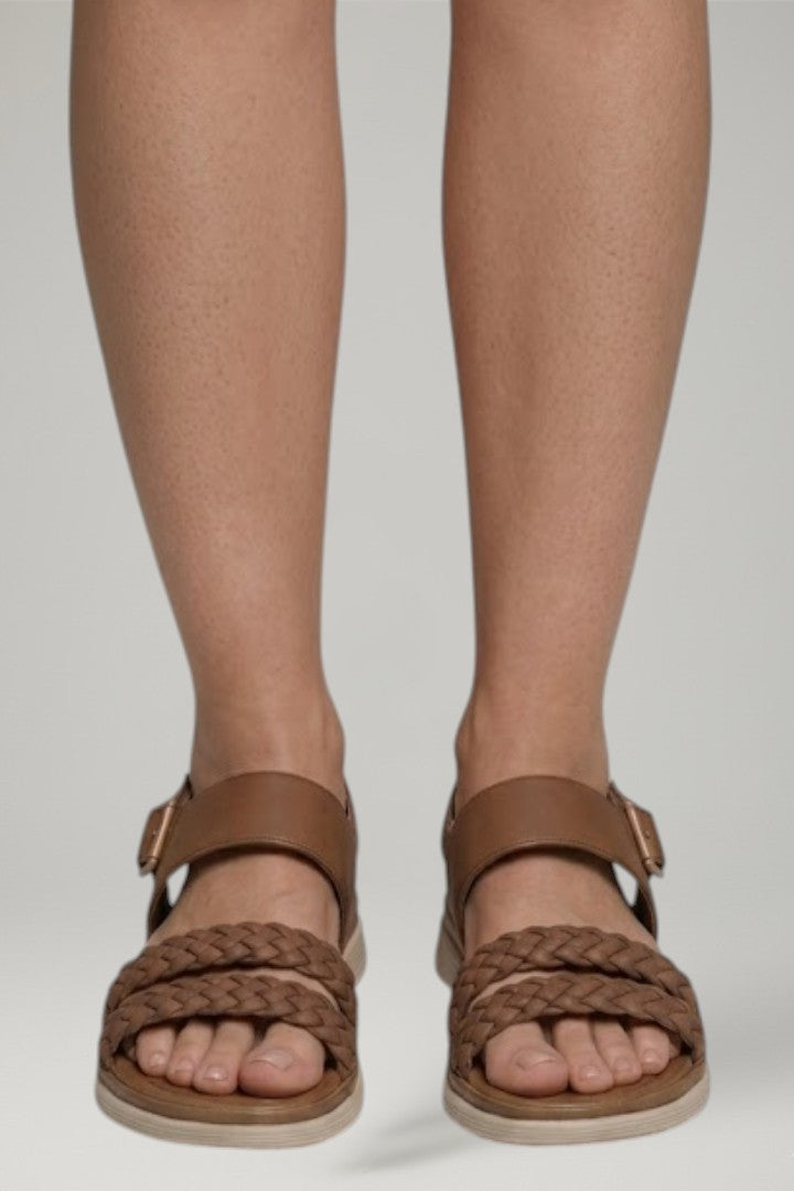 Lightweight open-toe women's sandals featuring a comfortable cushioned footbed and flexible sole.
