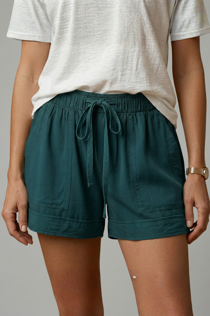 Women's summer shorts with drawstring & relaxed fit, great for active days.
