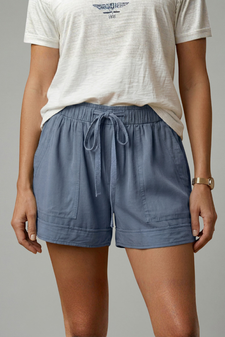 Soft fabric women's shorts, relaxed fit, drawstring closure for ultimate comfort.