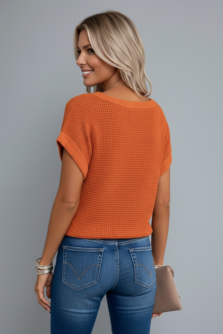 Elegant women's short sleeve t-shirt with a textured finish and beautiful lace trim detailing.