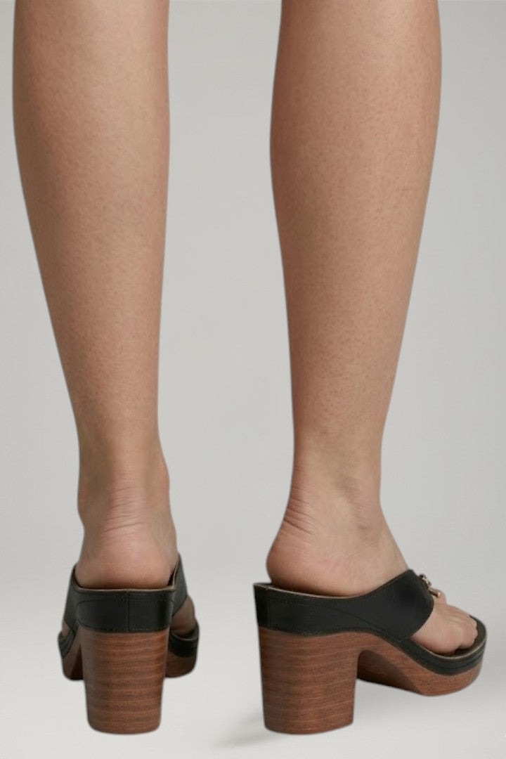 Comfortable women's platform thong sandals featuring a trendy block heel and open toe design.