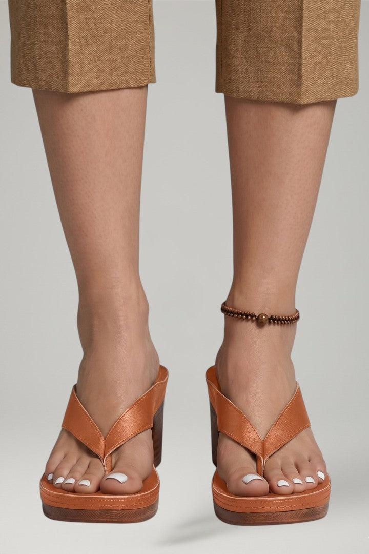 Women's block heel platform thong sandals for a chic summer look. Easy slip-on style.