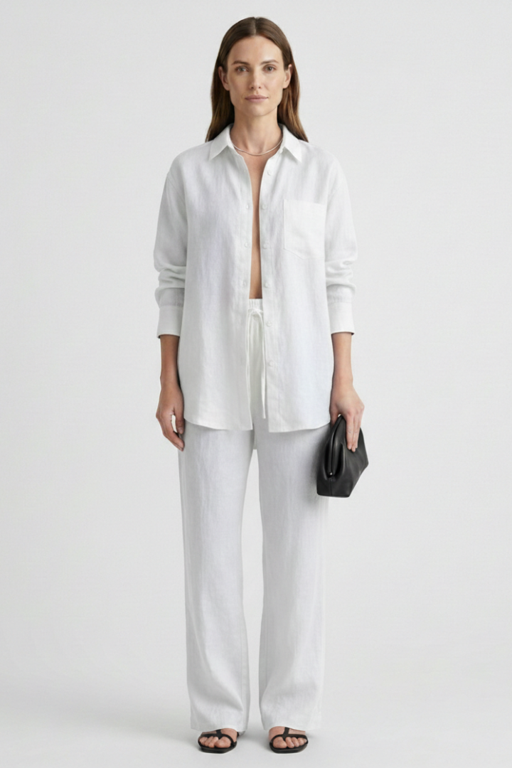 Women's elegant two-piece set: button shirt & straight trousers. Business casual or stylish spring/summer.