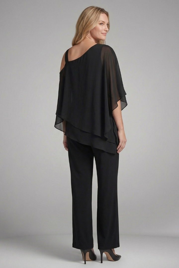 Modern women's fashion: asymmetrical top & chic wide-leg pants two-piece set for a stylish summer outfit.