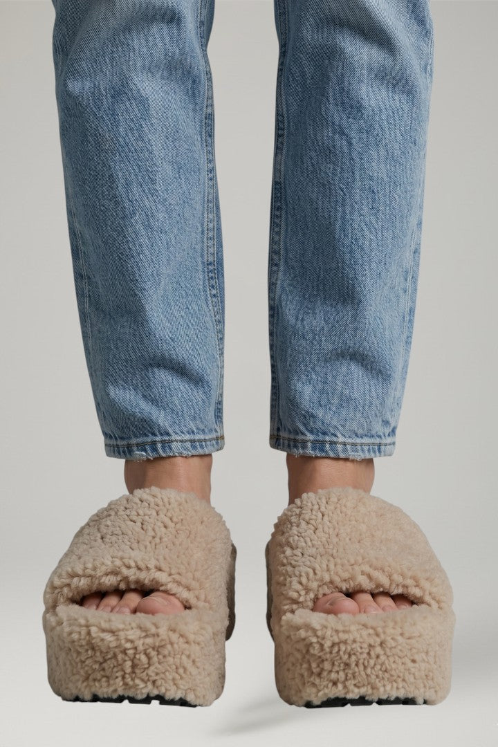 Stylish women's platform wedge sandals, perfect slip-on summer footwear for casual chic.