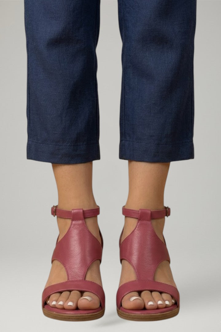 Elegant ladies' T-strap wedge sandals, slip-on design with a comfortable cushioned footbed.