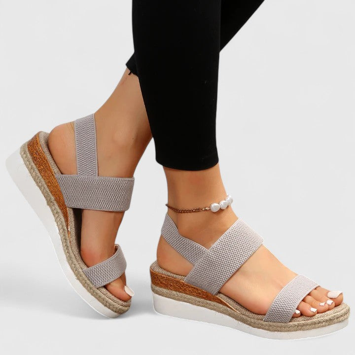 High-quality studio shot of women's orthopedic comfort wedge sandals, showcasing premium design.