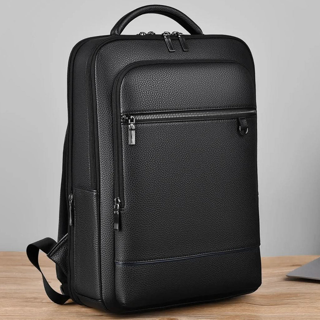 Ergonomic smart USB backpack for work and travel, minimalist & spacious design, water-resistant.