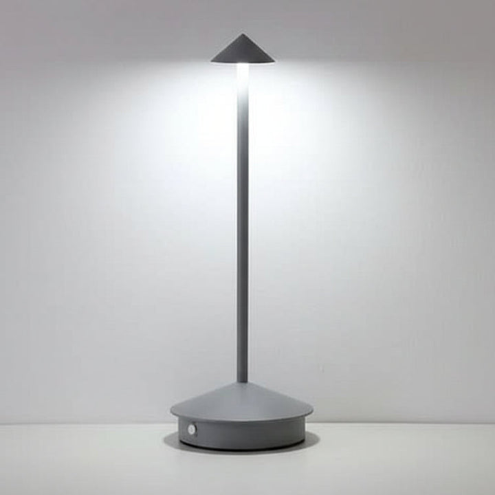 Close-up of a modern, dimmable wireless LED spotlight, perfect for flexible indoor accent lighting.