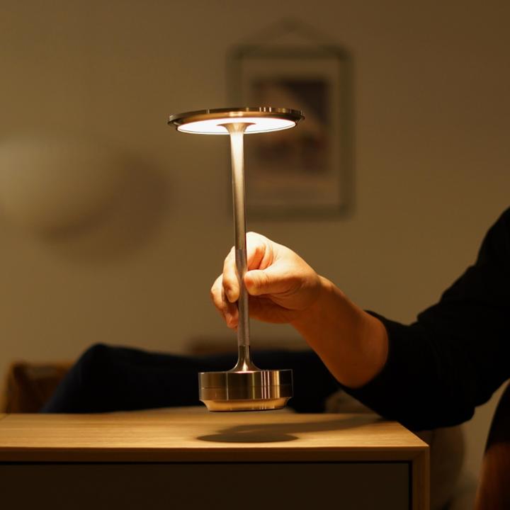 Adjustable cordless metal table lamp with IP66 waterproof, sleek modern design, crafted from high-grade metals, touch control