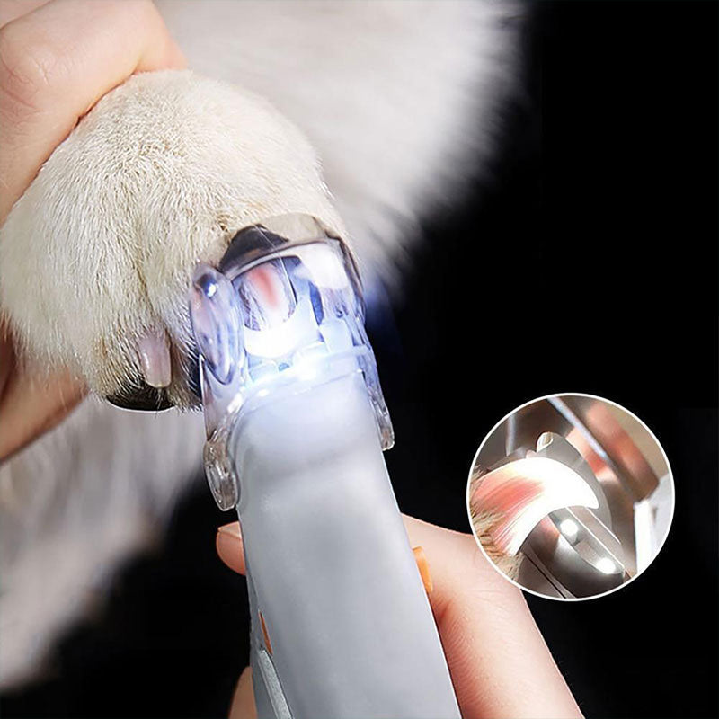 Stainless steel dog nail clipper with quick sensor and LED for gentle, safe pet grooming & nail care.