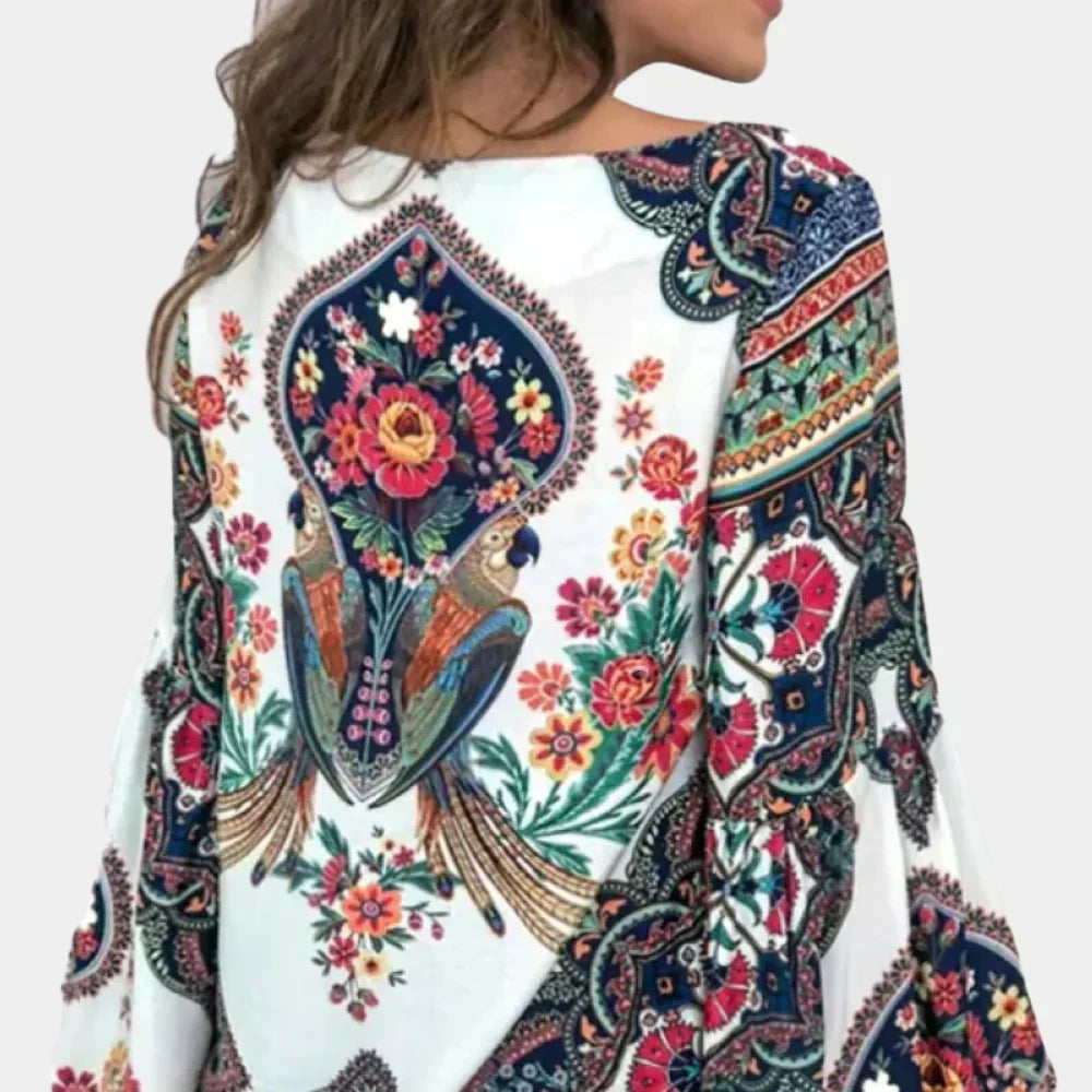 Beautiful women's floral print summer blouse; lightweight & breathable fabric ensures breezy comfort.