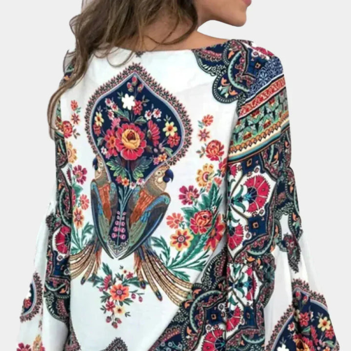 Beautiful women's floral print summer blouse; lightweight & breathable fabric ensures breezy comfort.