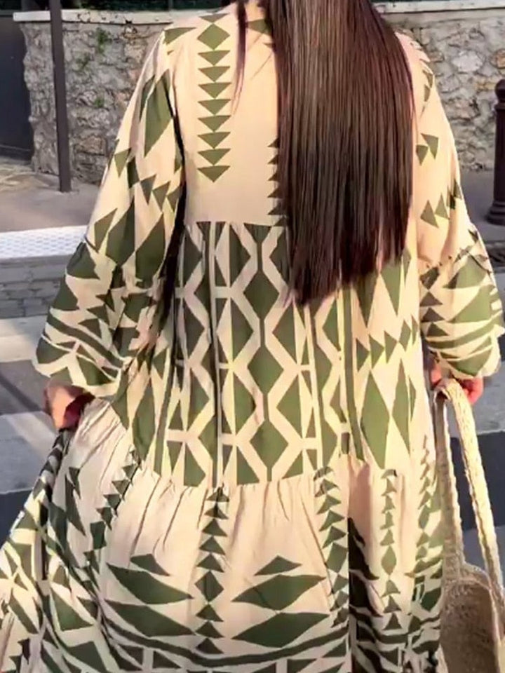 Vibrant women's maxi dress, long sleeve, round neck. Flowy, loose fit & comfortable for any summer casual or holiday outing.