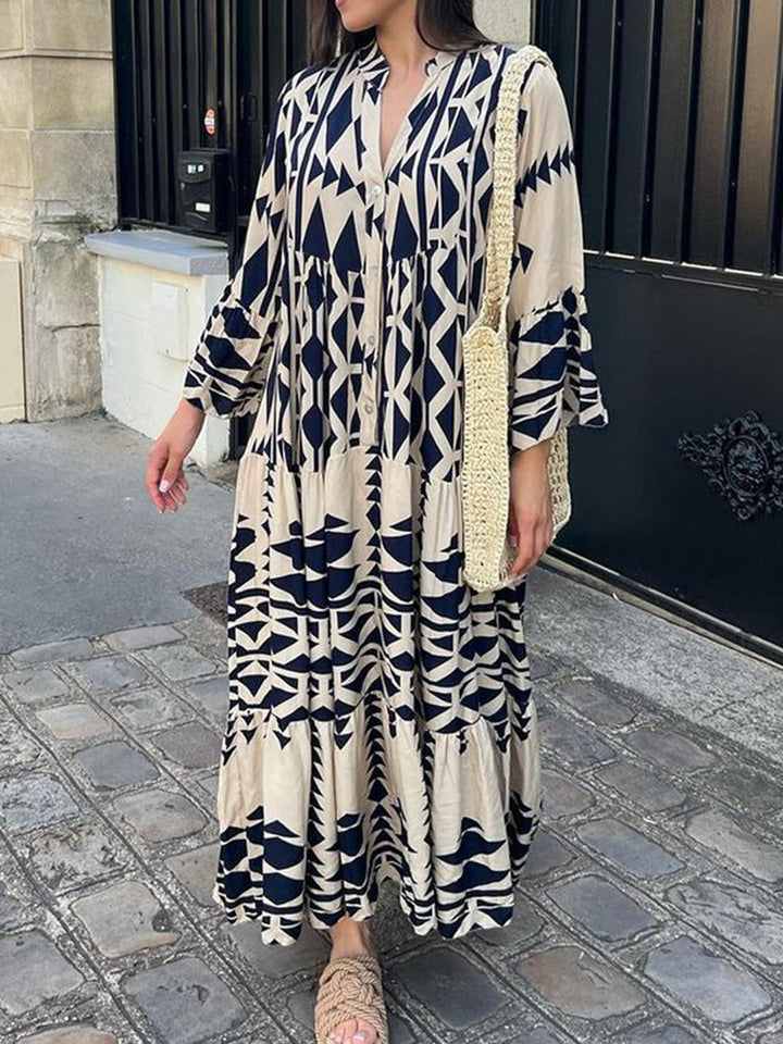 Women's flowy maxi dress, perfect for summer. Comfortable, long sleeve, round neck, and loose fit for beach or casual wear.