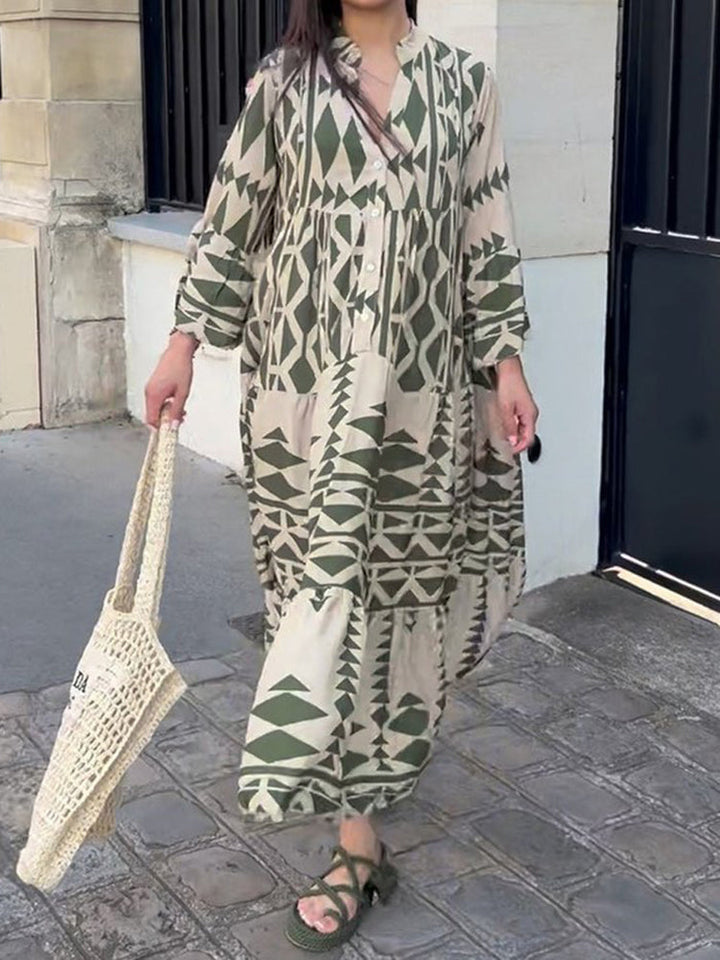 Colorful women's maxi dress with long sleeves & round neck. Loose fit, comfortable, and flowy for summer holidays.