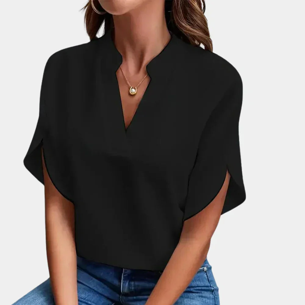 Women's breezy short sleeve summer blouse, loose fit, perfect for casual everyday wear.