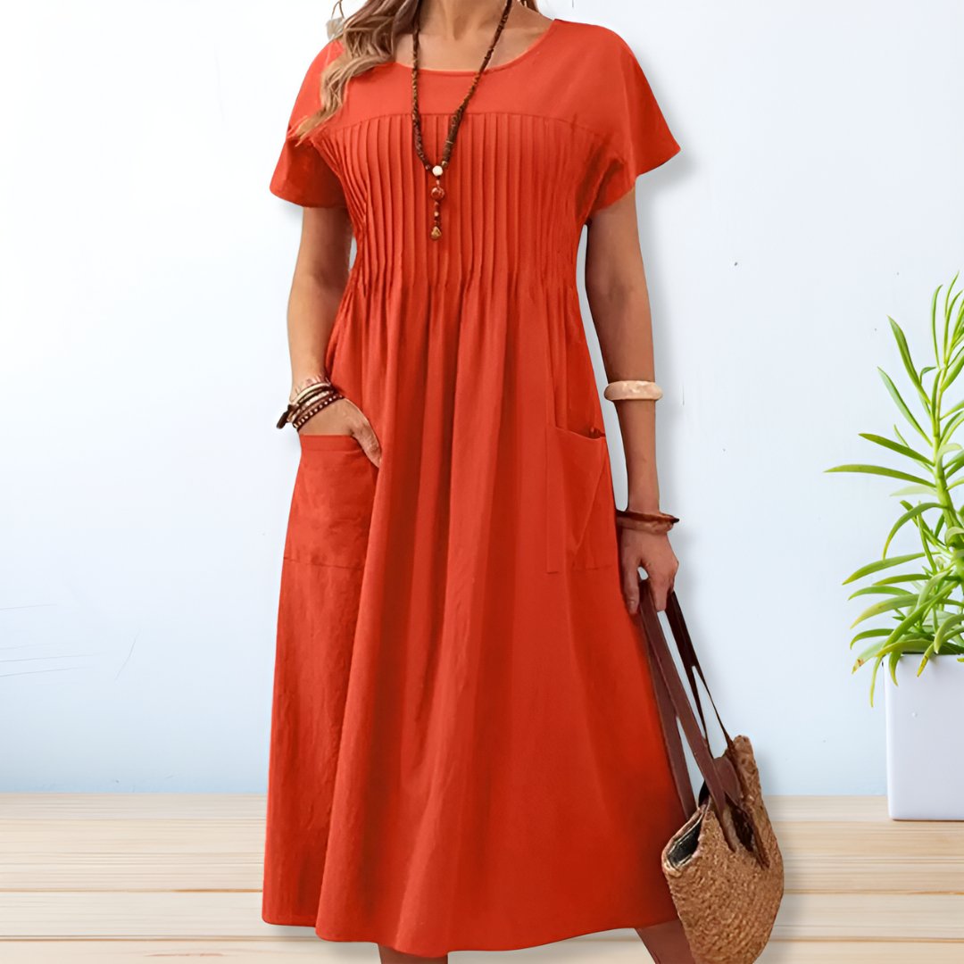 Stylish women's relaxed fit midi dress, ideal for effortless everyday wear or a comfortable weekend outfit.