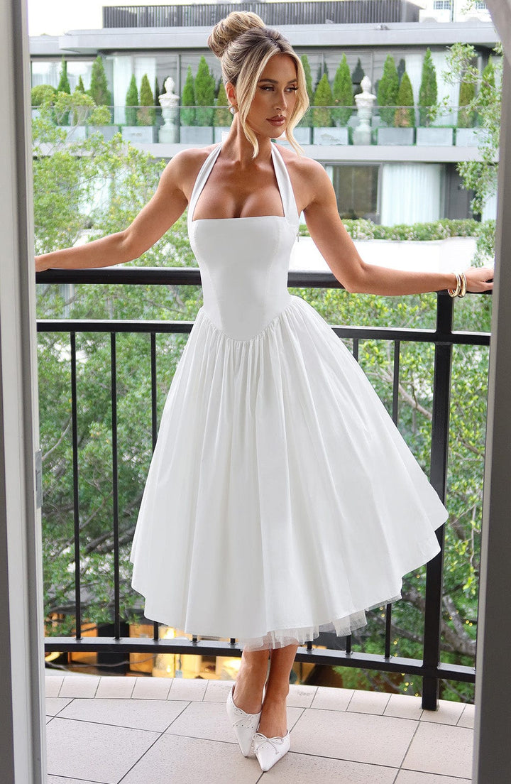 Black and white halter midi dress by Ash New York, formal wedding guest outfit for women