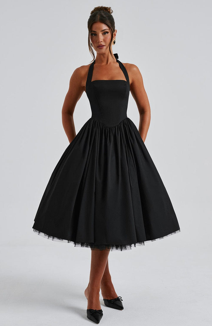 Ariana halter midi dress on mannequin, monochrome wedding guest dress and formal occasion midi