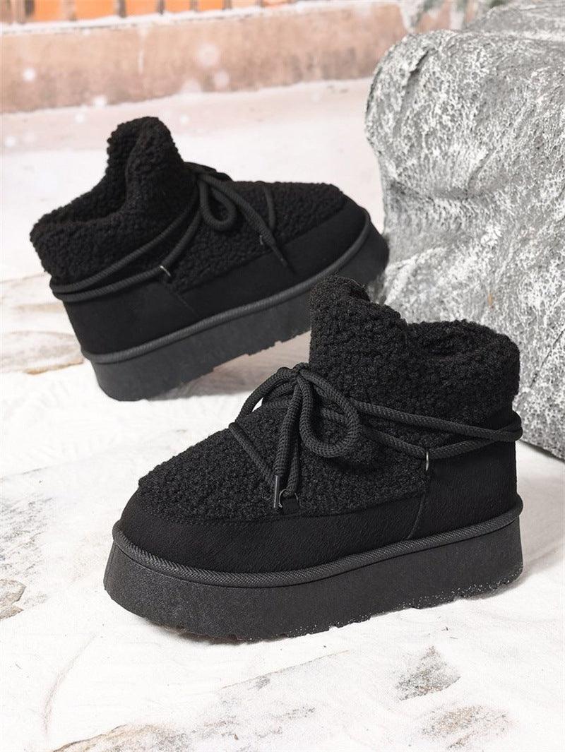 Close-up of Aurelia women's cozy boots showcasing the soft fleece lining and sturdy lace-up design.