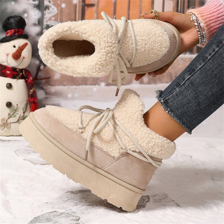 Women's Aurelia boots: comfortable, casual, lace-up winter footwear with a plush interior for warmth.