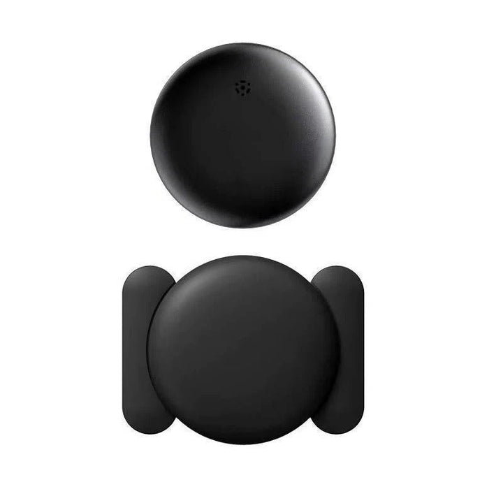 Magnetic GPS car tracker securely attached to a vehicle's underside, offering real-time asset tracking. Weatherproof design.