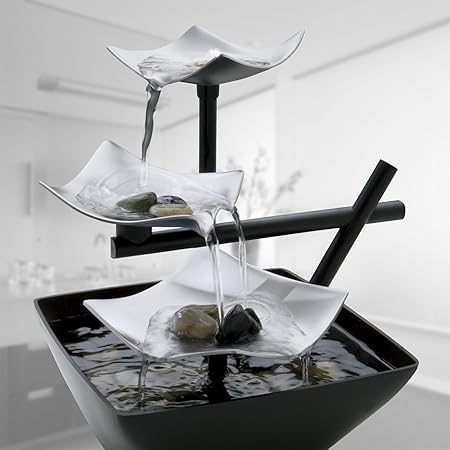 Elegant tabletop water fountain with silver springs design, soothing sounds for indoor relaxation & zen decor.