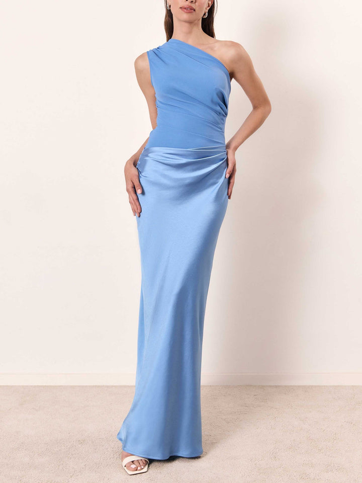 Stylish light blue pleated maxi dress for women, featuring an elegant asymmetric design, perfect for special occasions.