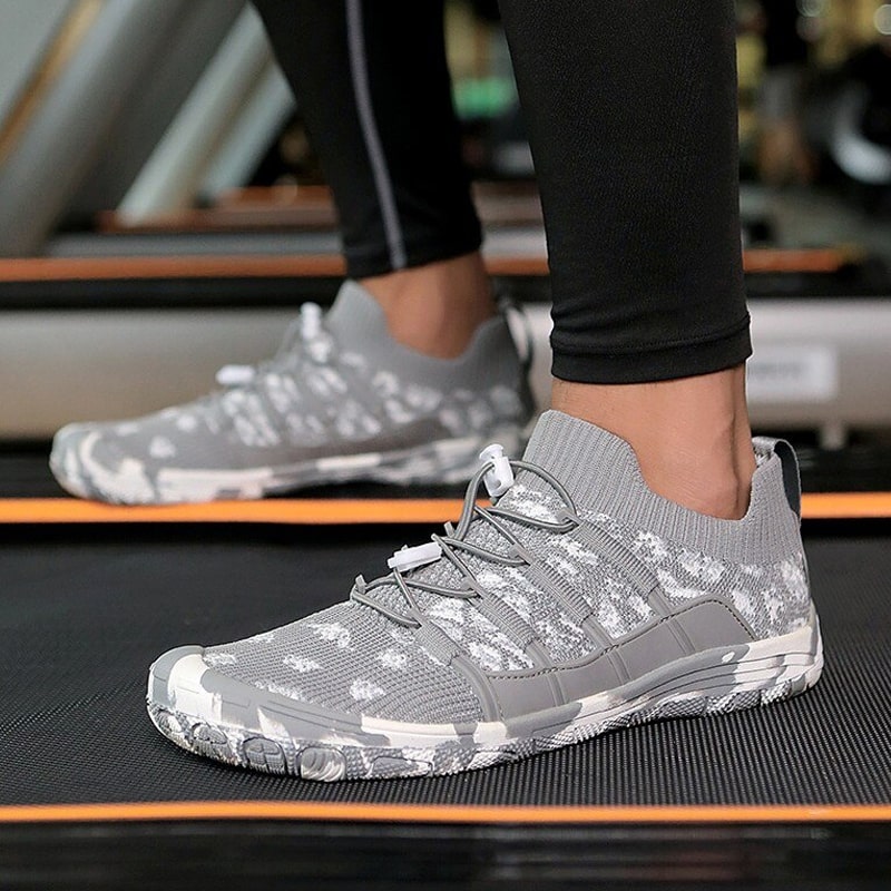Lightweight barefoot gym shoes with non-slip traction for indoor training & yoga.