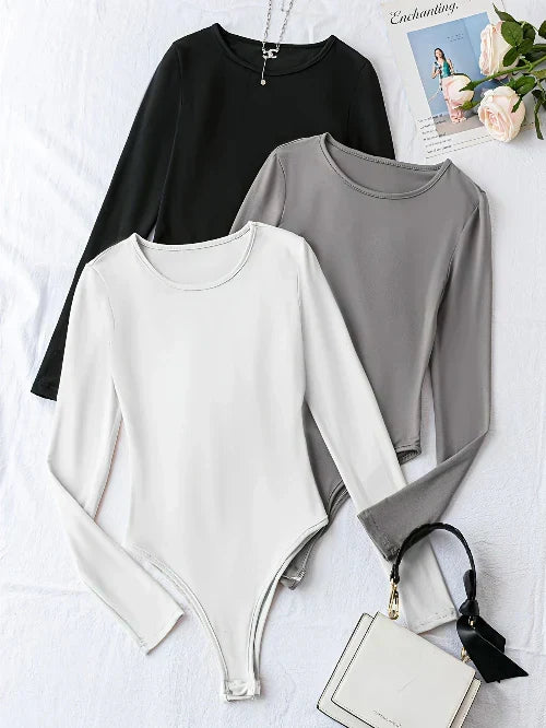 Chic women's slim fit long sleeve crew neck bodysuits, 3-pack. Elevate your everyday style.