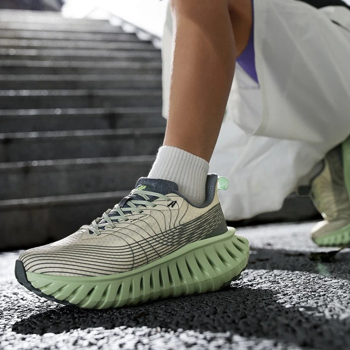 Casual unisex sneakers in black & green, designed for comfort & athletic performance