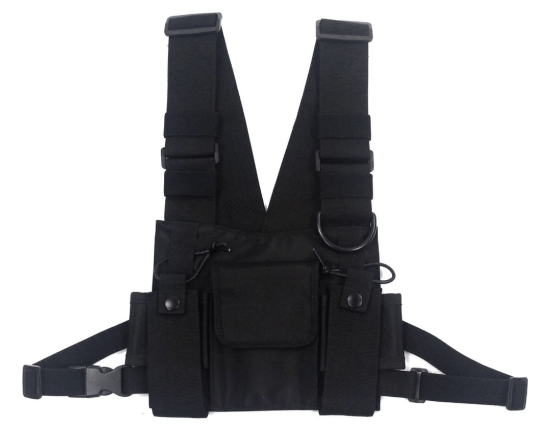 Model wearing a black tactical chest rig harness bag, showcasing its streetwear and utility style