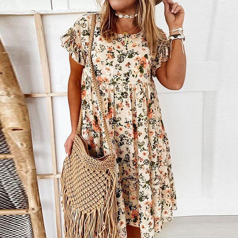 Women's boho floral midi dress with ruffles & fitted waist. Perfect for summer vacations.
