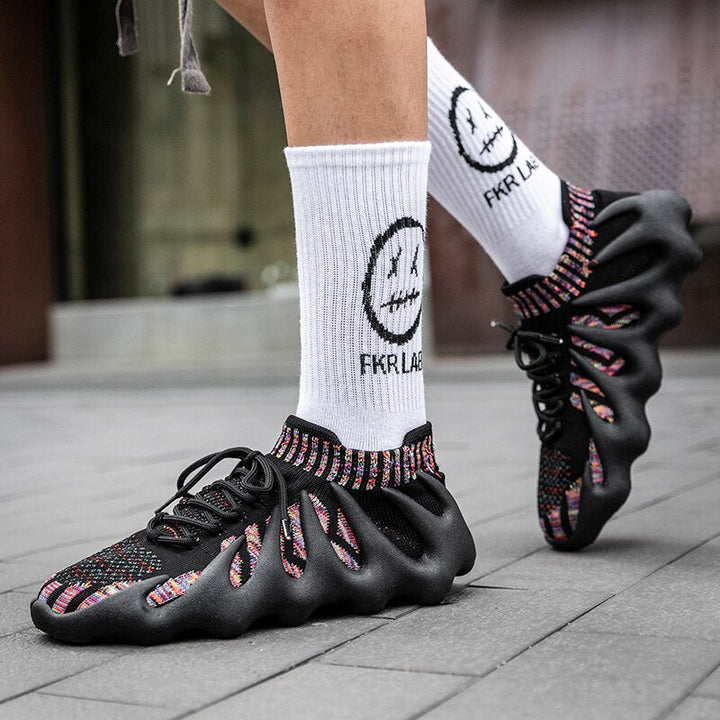 Laced men's versatile sports footwear, breathable mesh design for ultimate comfort.