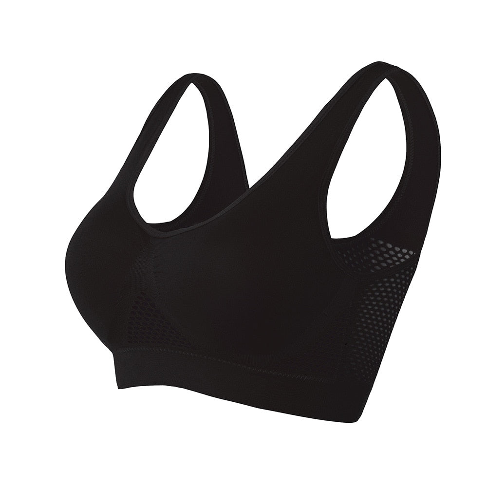 Athletic women's breathable mesh sports bra, designed for optimal comfort during fitness workouts.