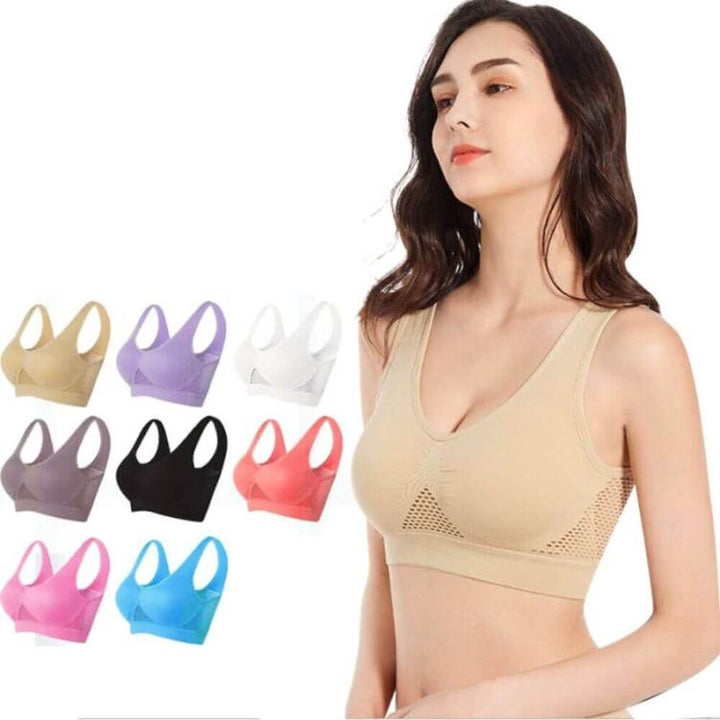 Women's workout sports bra with seamless design & breathable mesh for ultimate support.