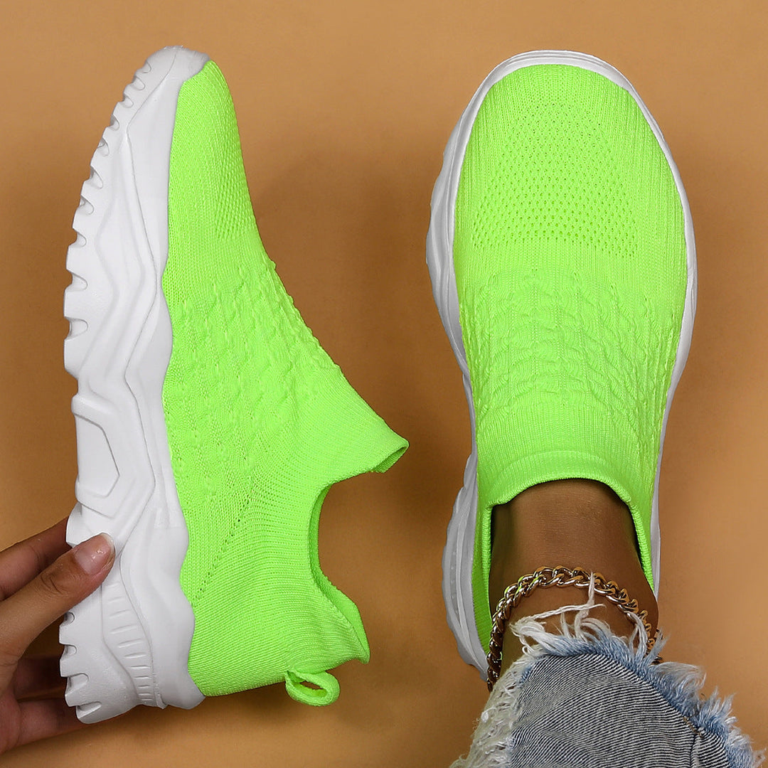 Bright green unisex Ortho Cloud slip-on shoe, showing easy wear and orthopedic comfort.