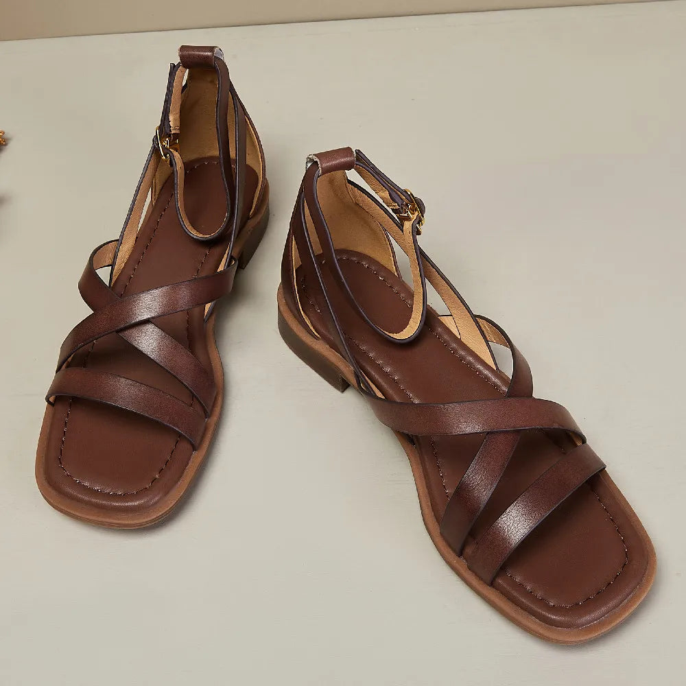 Close-up of the footbed of a women's leather comfort sandal, emphasizing ergonomic design