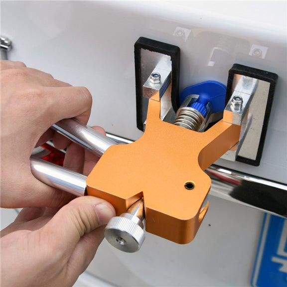 "Car dent repair puller tool with high-carbon steel handle and silicone base, ideal for paint-safe dent removal."