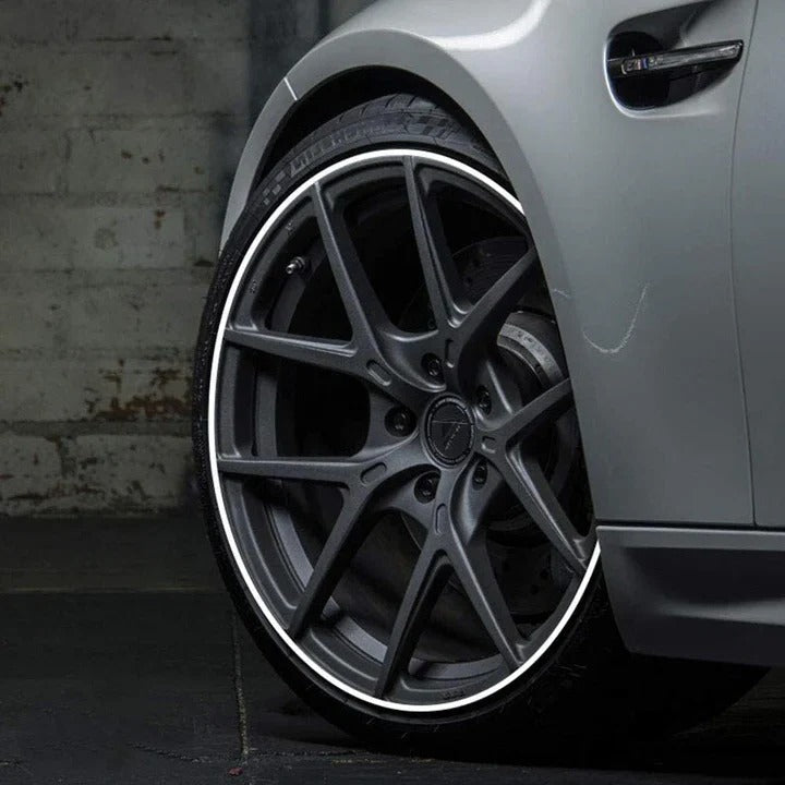 Flexible curb protector for car wheels, keeps rims safe from scuffs & damage.
