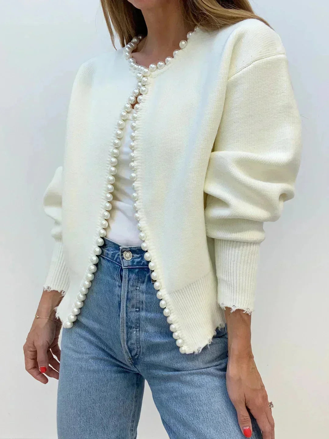 Stylish women's knit cardigan with pearl trim, perfect for sophisticated workwear or brunch outfits.