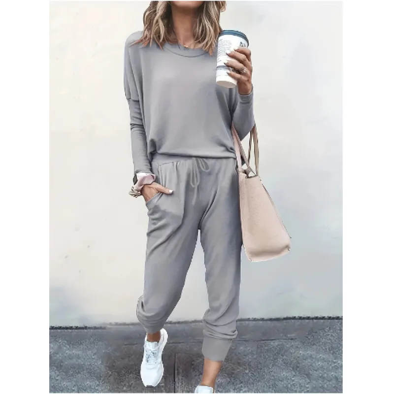 Soft fabric women's lounge set featuring a crew neck sweatshirt and comfortable tapered jogger pants.