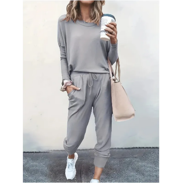 Soft fabric women's lounge set featuring a crew neck sweatshirt and comfortable tapered jogger pants.